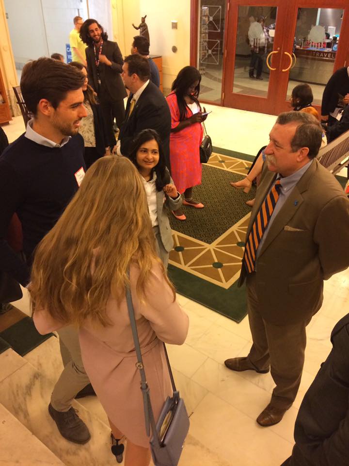 Representative Mark McBride talks with students at the Oklahoma State Capitol.